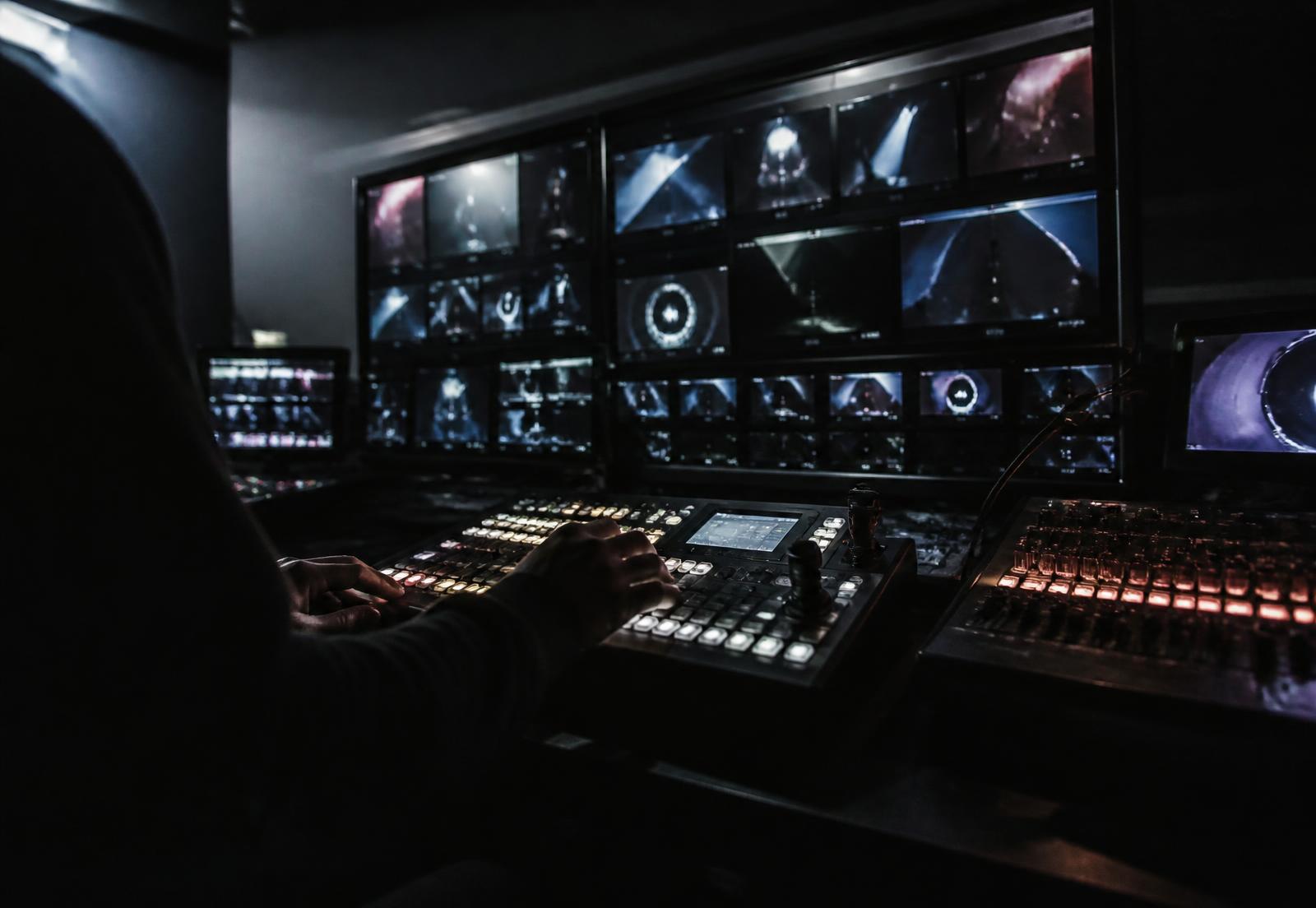 Live production control position with multiviewer monitors and vision mixer
